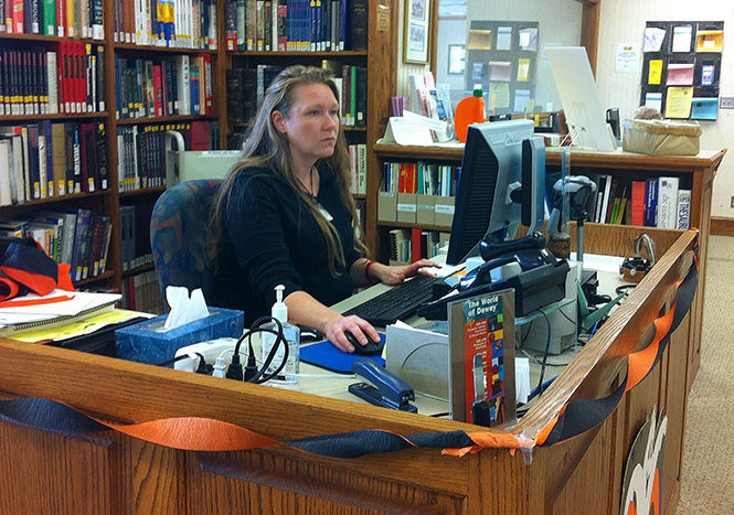 Courtney+Caldwell%2C+adult+reference+librarian+at+the+Aurora+Memorial+Library%2C+said+if+the+Issue+15%2C+a+new+tax+levy+for+the+Portage+County+District+Library%2C+passes%2C+it+can+help+the+library+buy+new+materials+and+offer+more+e-media+and+downloadable+content+for+its+users.
