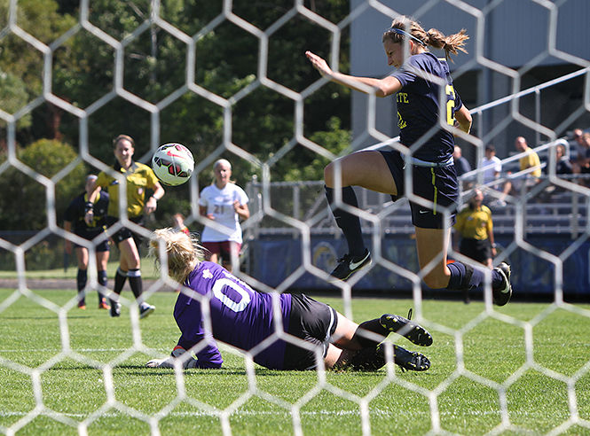 Sophomore Jenna Hellstrom attempts a shot on goal at the Kent State game against Eastern Kentucky on Sept. 21, 2014. The Flashes won, 3-0.