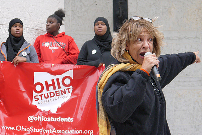 Mama Sue Smith speaks at the John Crawford Rally at the Ohio Statehouse Saturday, Oct. 18, 2014. John Crawford was shot and killed by two police officers at the Beavercreek Walmart in early August and the rally was held to demand justice for John Crawford as well as protest police brutality.