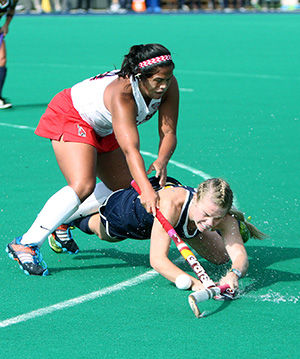 Sophomore forward Madison Thompson and Ball States Mikayla Mooney fight for the ball during Kent States 6-1 victory on Saturday, Oct. 25, 2014 at Murphy-Mellis field. The Flashes improved their record to 7-8 with the win and are undefeated in the Mid-American Conference.