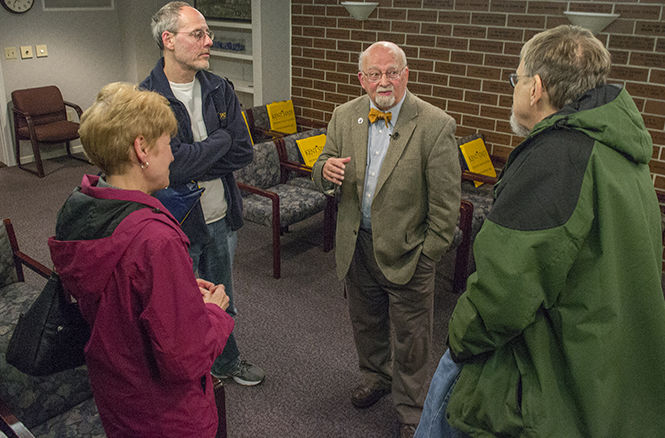 Professor Jerry Lewis, author of the book Sports Fan Violence in North America, speaks with alumni following his lecture on sports fan violence and its sociological impact Thursday, Nov. 6, 2014 in the Williamson Alumni Center.