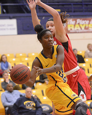 Sophomore guard Krista White struggles to pass around the heavy defense of Youngstown State during Kent States 68-49 loss in the M.A.C. Center on Tuesday, Nov. 18, 2014.