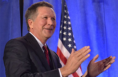 Governor John Kasich celebrates his re-election with a roaring crowd at the Ohio GOP watch party in Columbus on Tuesday, Nov. 4, 2014.