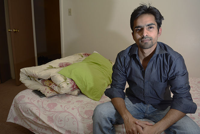 International student Shirish Bhatnagar at his Silver Meadows apartment in Stow on Wednesday, November 19, 2014.