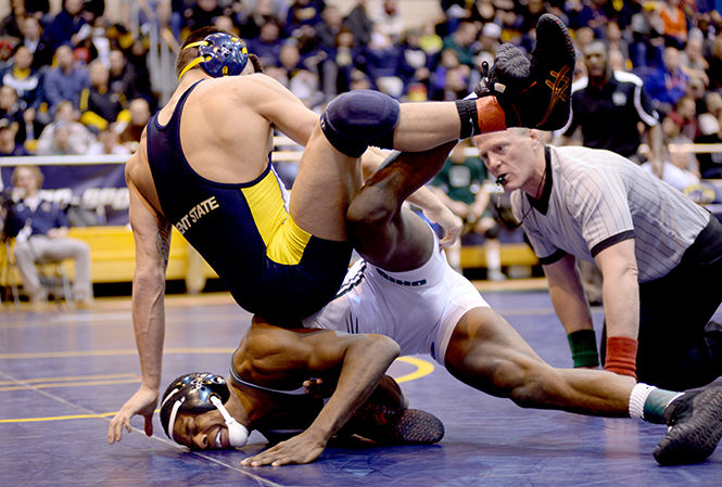 Kent States Michael DePalma wins his final match at the 2014 MAC Championship wrestling meet Sunday, March 8, 2014, in the M.A.C. Center. DePalmas final defeat against an Ohio University player won him third place in his weight class.