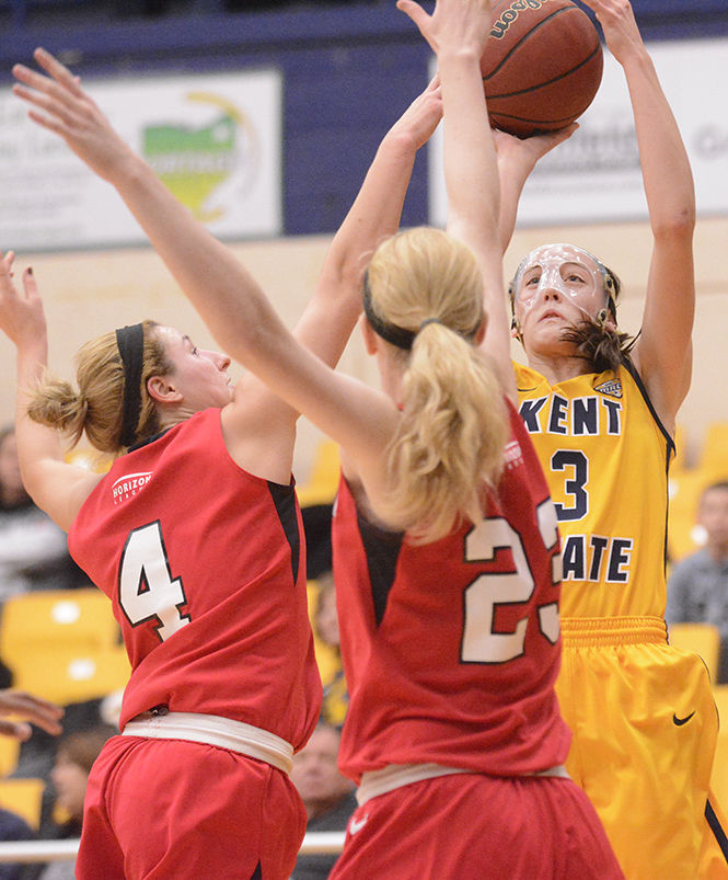 Sophomore guard Larissa Lurken goes up for a shot during Kent States 68-49 loss against Youngstown State inside the M.A.C. Center on Tuesday, Nov. 18, 2014.
