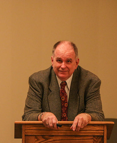 Paul Bartrop, the director for the Center of Judaic, Holocaust, and Genocide Studies, speaks at the Cohn Jewish Center. Bartrop discussed representing the Holocaust in film and accurately portraying the Holocaust in modern day media on Jan. 26, 2015.