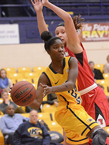 Sophomore guard Krista White struggles to pass around the heavy defense of Youngstown State during Kent States 68-49 loss in the M.A.C. Center on Tuesday, Nov. 18, 2014.