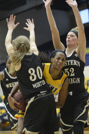 Redshirt senior center CiCi Shannon gets double teamed in the paint during Kent States 55-78 loss against MAC conference rivals Western Michigan on Saturday, Jan. 24, 2015 in the M.A.C. center. The loss drops the teams record to 3-14 overall, 1-5 in the MAC conference.