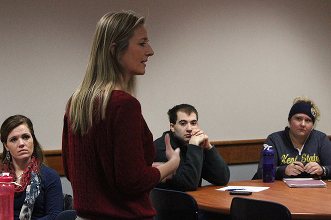  (from left) Clinical mental health counseling major Jessica Knicely, justice studies major Ryan Lewand and educational studies major Tiffany Hawley, all veterans, listen to psychologist Dr. Kirsten DeLambo, Ph.D, at a Peer Mental Suicide Training. DeLamdo discussed topics such as suicide prevention, challenges facing veterans, PTSD, depression and other mental health disorders at the session, which was on the third floor of the Student Center on Friday Feb. 6, 2015.