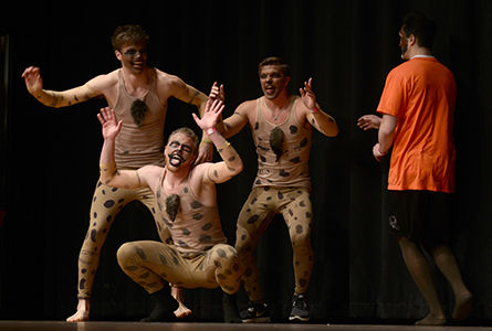 Members of the Pi Kappa Alpha fraternity play three hyenas in the thier version of The Lion King during the Delta Zeta lip sync on March 1, 2014.