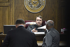 State District Judge Jason Cashon gets the verdict of guilty from the jury at the capital murder trial of former Marine Cpl. Eddie Ray Routh at the Erath County, Donald R. Jones Justice Center in Stephenville, Texas, on Tuesday, Feb. 24, 2015. Routh, 27, of Lancaster, was convicted of the 2013 deaths of Chris Kyle and his friend Chad Littlefield at a shooting range near Glen Rose, Texas. (Michael Ainsworth/Dallas Morning News/TNS)