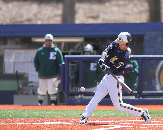Kent State University sophomore Luke Burch gets a hit during Kent State’s 8-6 victory over Eastern Michigan University and Schoonover Stadium on Sunday, March 29, 2015. The Flashes won 2 of 3 games in the series to improve their record to 12-11 overall.