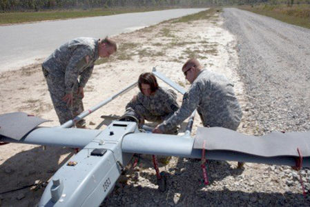 A drone being examined at Camp Atterbury in Indiana, one of the test ranges of the Uunmanned Aircraft Systems Center. Photo courtesy of Ohio/Indiana UAS Center program manager Brittany Peterson.