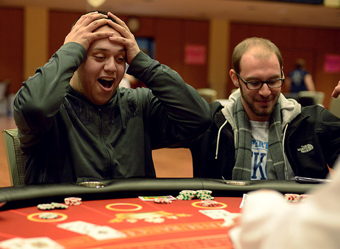 Junior public communications major Noah Ickowicz reacts as he busts during a game of blackjack at the Purim Casino Night on Thursday, Mar. 5, 2015 in the Kent State Ballroom.