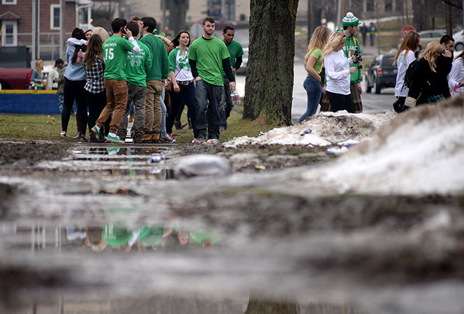 Students celebrate Fake Patty’s Day on College Avenue on Saturday, March 14, 2015.