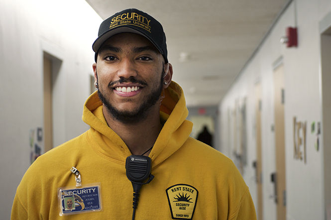 Julien Johnson, A senior philosophy major, has worked as a security aide for nearly three years. He prides himself in getting to know the residents he looks after.