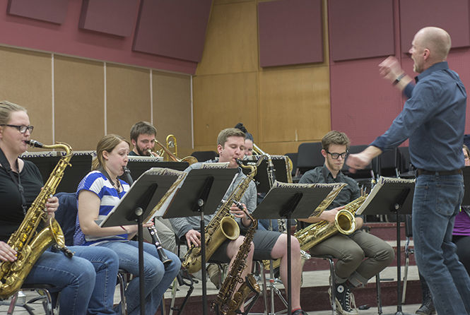 The Kent State University Jazz Ensemble, led by Director Robert Selvaggio, practices in the Kent Center for Performing Arts on Monday, March 30, 2015 as they prepare for their Friday concert with guest artist and jazz saxophonist Donny McCaslin.