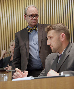 Provost Todd Diacon stands up and leaves after a question is directed at him during an open forum held by students to address the race issues at Kent State in the Governance Chambers on Wednesday, April 22, 2015.