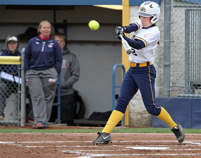 Senior+outfielder+Kim+Kirkpatrick+hits+a+home+run+during+the+first+inning+of+Kent+States+11-3+win+against+Robert+Morris+on+Wednesday%2C+April+22%2C+2015.