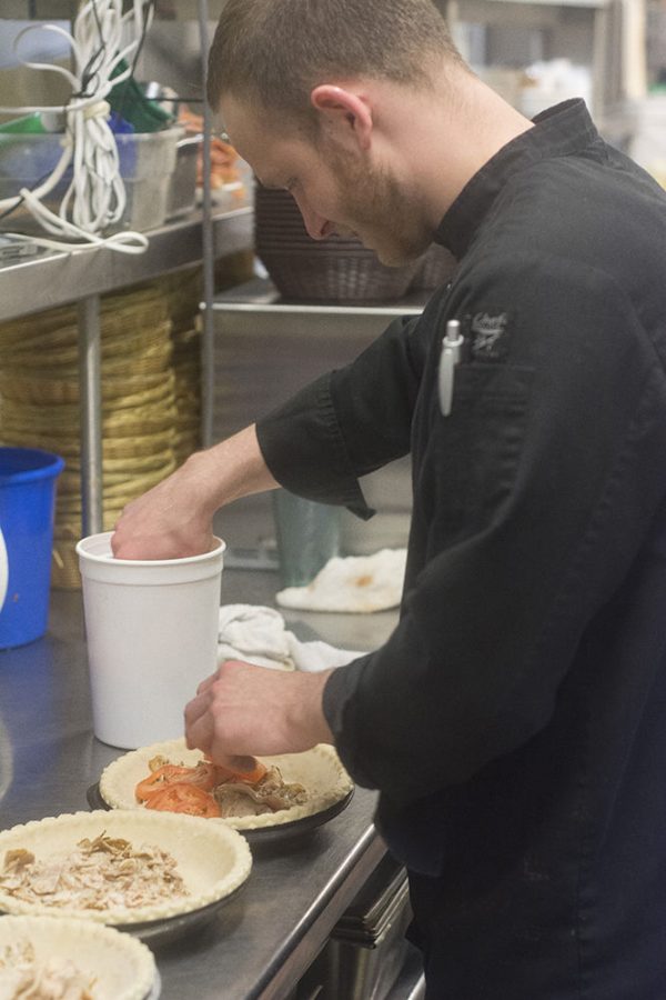 Jeff Markgraf prepares a couple of quiches at Ray’s Place in Downtown Kent on Tuesday, April 7, 2015. Ray’s Place was voted the best place to take your parents in Kent.
