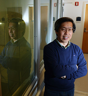 Hiroshi Yokoyama, director of Kent States Liquid Institute, poses for a portrait outside of the third floor laboratory that will be the primary facility for incoming students of a new Liquid Crystal masters program in fall of 2015. Yokoyama will direct the new program.