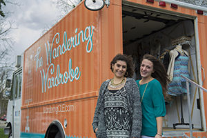 Caroline Dengel and Sarah Ferrato from The Wandering Wardrobe, a Cleveland-area traveling fashion boutique, made a stop at Kent State outside Rockwell Hall on Tuesday, April 21, 2015, donating 30 percent of their procedes from the day to Flashanthropy.