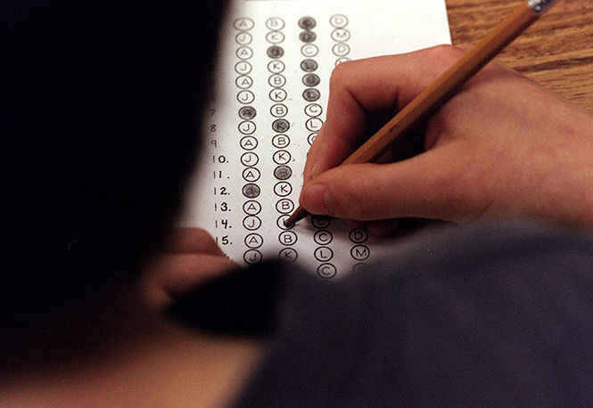 In this March 12, 1999 file photograph, a student fills in his answer to the practice test question for a standardized test, in Roswell, Georgia. (Anitta C. Charlson/Atlanta Journal-Constitution/MCT)