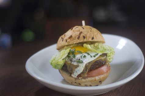 A burger crafted by Bar 145 chef Molly Wednt. Bar 145, the burger and bourbon bar on E. Erie Street, won best burger in Kent.