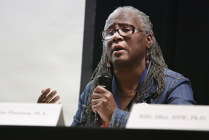 Denise Harrison, lecturer of English at Kent State, speaks during the Native American Panel Discussion in Oscar Ritchie hall on Tuesday, April 21, 2015.