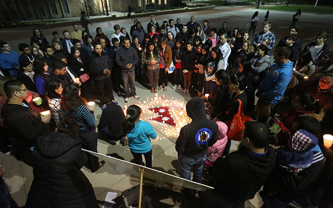 A candle light vigil in Risman Plaza allowed a chance for students to join in prayer and thought to commemorate those lost in the recent earthquake that struck Nepal. April 28, 2015.