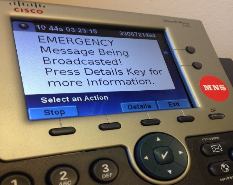 Phones throughout Kent States campus will be enabled to display text alerts on their screens during campus emergencies. Phones with this capability will be labeled with a red sticker that says MNS, which stands for Mass Notification System.