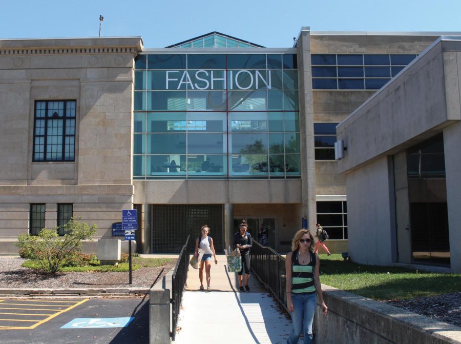 Students walk out of The Kent State Fashion Building Tuesday, Sept. 15, 2015. The increase of enrollment has faculty questioning what this means for the constantly growing fashion school.