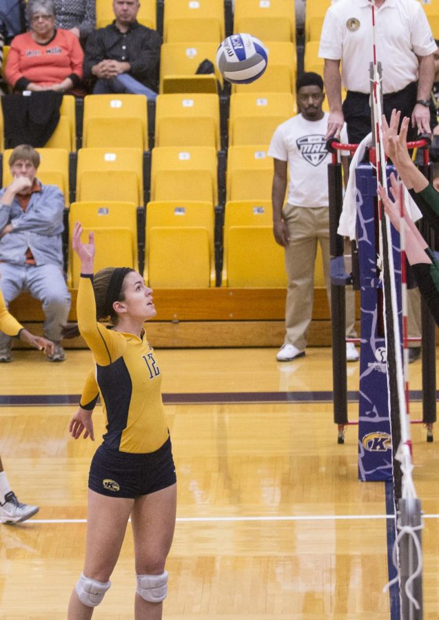 Kent States Junior middle blocker Bridget Wilhelm goes up for a spike during their game against MAC opponents Ohio University in the M.A.C. Center on Thursday, Oct. 30, 2014. The flashes lost the game 3-1 bringing their overall record to 12-12.