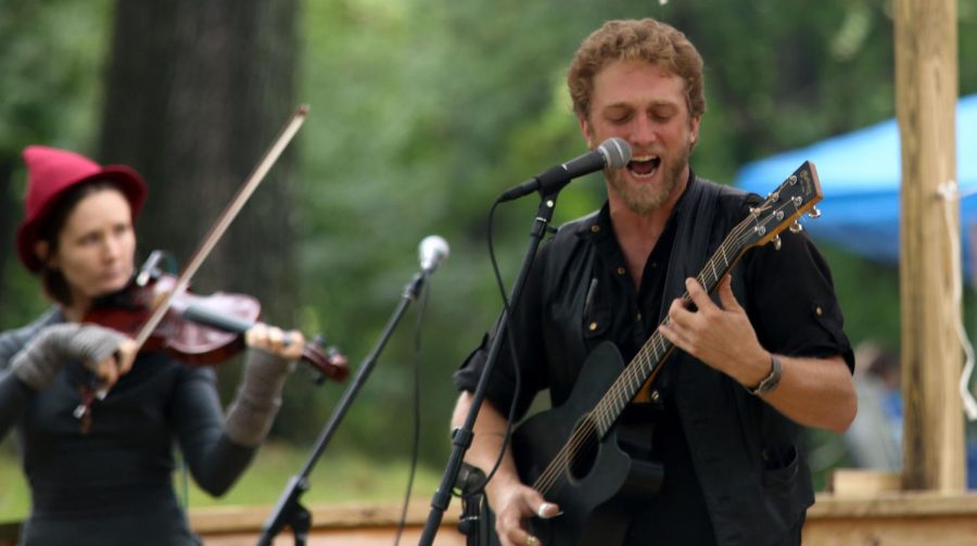 Brian Feltner performs at Fred Fuller Park during Art in the Park on Saturday Sept. 12, 2015.