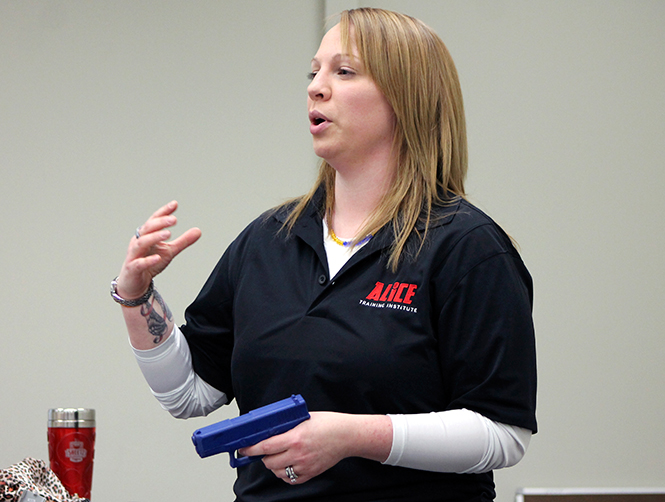 A.L.I.C.E instructor Emily Ribnik teaches Kent State-Stark education majors distraction tactics to use against an active shooter, Thursday, Feb. 26, 2014. A.L.I.C.E, which stands for alert, lock down, inform, counter and evacuate, is a training program that teaches educators and students how to react if an active shooter is in the school.