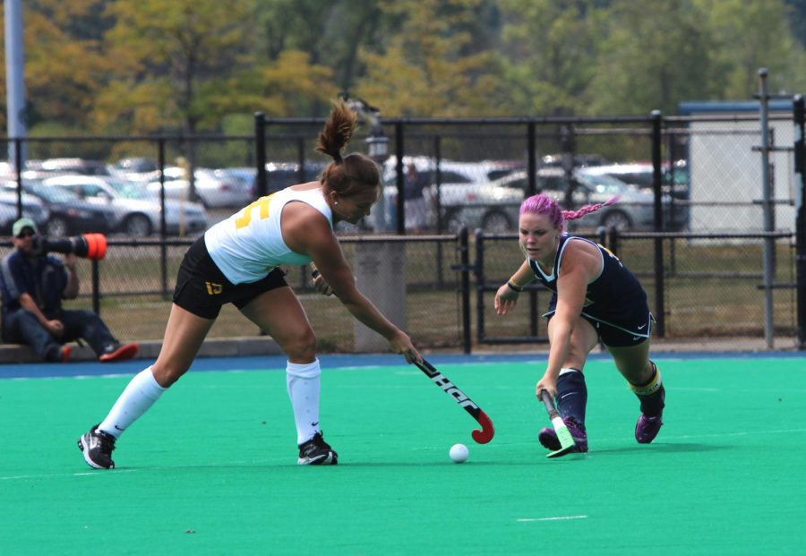 Forward Madison Thompson reaches for the ball during a game versus Virginia Commonwealth University at Murphy-Mellis Field on Saturday, Aug. 29, 2015. The Flashes won in double over-time 4-3.
