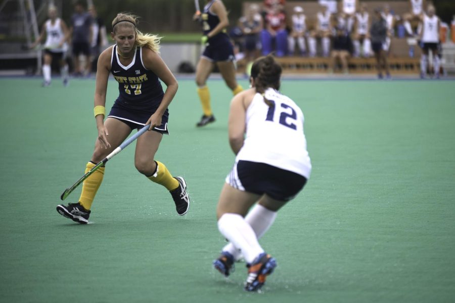 Caroline Corthouts, senior, goes up against Jordan Chapman, junior, in the game against Longwood University at Murphy-Mellis Field on Sunday Sept 27, 2015. The game ended with a win for the Flashes, 5-1.