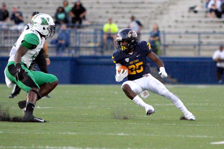 Wide receiver Ernest Calhoun returns a kick during the third quarter of the Kent State vs Marshall football game on Sept. 26, 2015. The Flashes lost in double overtime, 36-29.