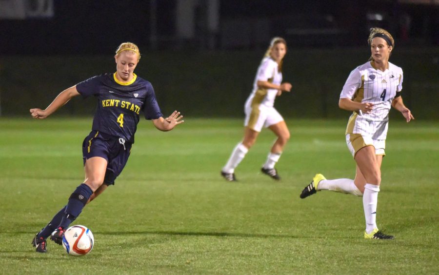 Karli Paracca, sophomore, controls the ball in the game against the Akron Zips at Cub Cadet Field on Friday, Sept. 25, 2015.