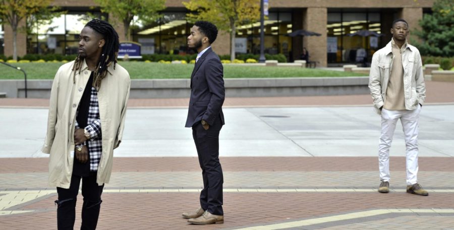 Fashion merchandising major Todd White (left), fashion merchandising major Donovan Vaughn (center) and criminal justice major Kelvin Bey (right) stand on The K outside of the Student Center on Wednesday, October 14, 2015, as part of The Classic Gentleman’s Club. 