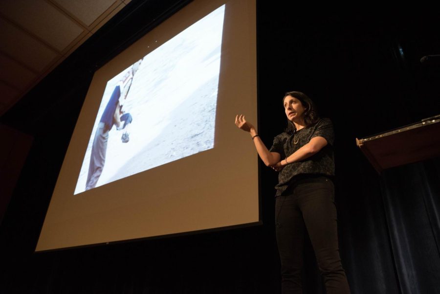 Emily Feldman opens here talk with the photo of the Syrian boy who drowned along with 12 others trying to swim to the Greek island of Kos. Tuesdsay Oct. 20, 2015.