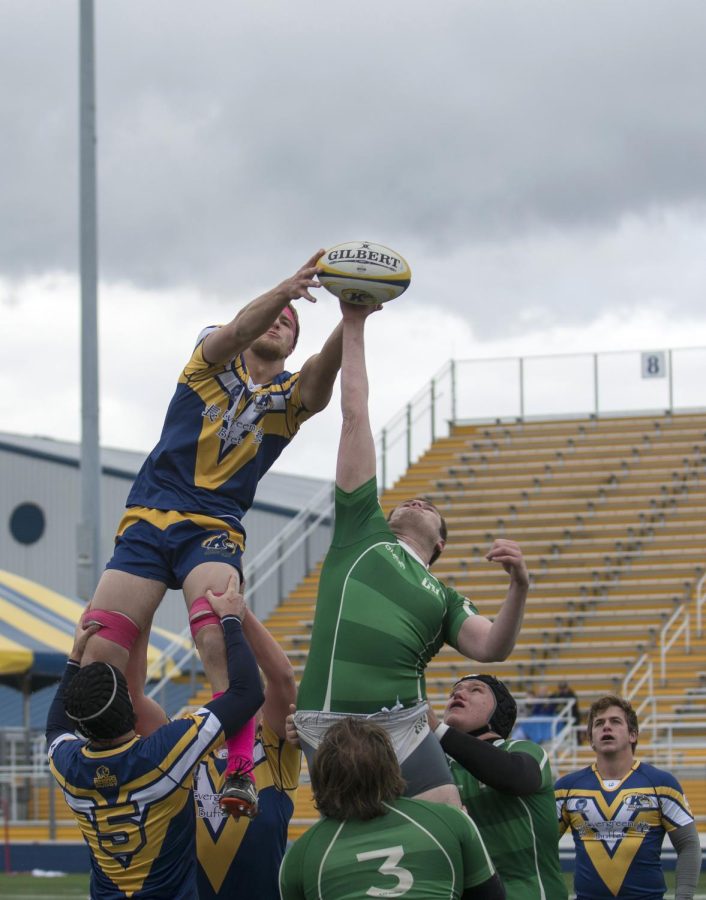 A Kent State men’s rugby player fights for possession of the thrown in ball during their game against Ohio University at Dix Stadium on Saturday, Oct. 17, 2015. Kent State only scored a single try during the match, losing to Ohio University 30-5.
