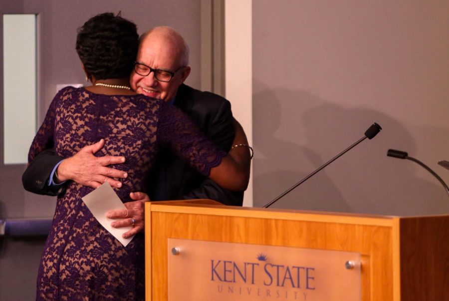 John Butte embraces Flash Track recipient Danielle Wiggins during the JMC Awards in Franklin Hall on Friday, Oct. 2, 2015.
