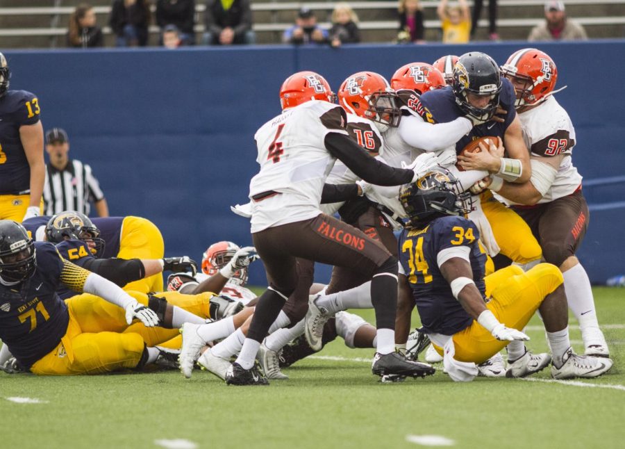 Quarterback George Bollas (#2), is sacked by the Bowling Green defense during the third quarter of the Kent State vs. Bowling Green football game on Oct. 24, 2015. The Golden Flashes lost 48-0.