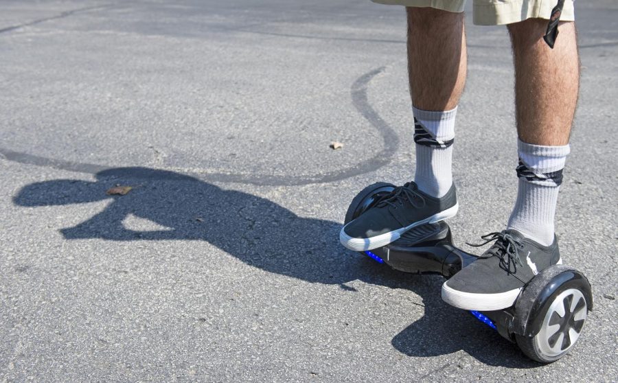 Logan Meis, 20, balances on his hoverboard outside his apartment complex in Overland Park, Kan., on Friday, Sept. 4, 2015. Meis purchased the personal transportation device for about $330 online. (Tammy Ljungblad/Kansas City Star/TNS)