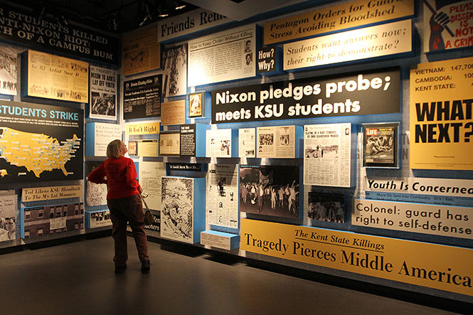 Kent State alumna Susan Avery, of Denver, Colorado, tours the May 4 Visitors Center Wednesday, Sept. 17, 2014. Avery graduated in 82 and said that she wanted to visit the center to pay her respects.