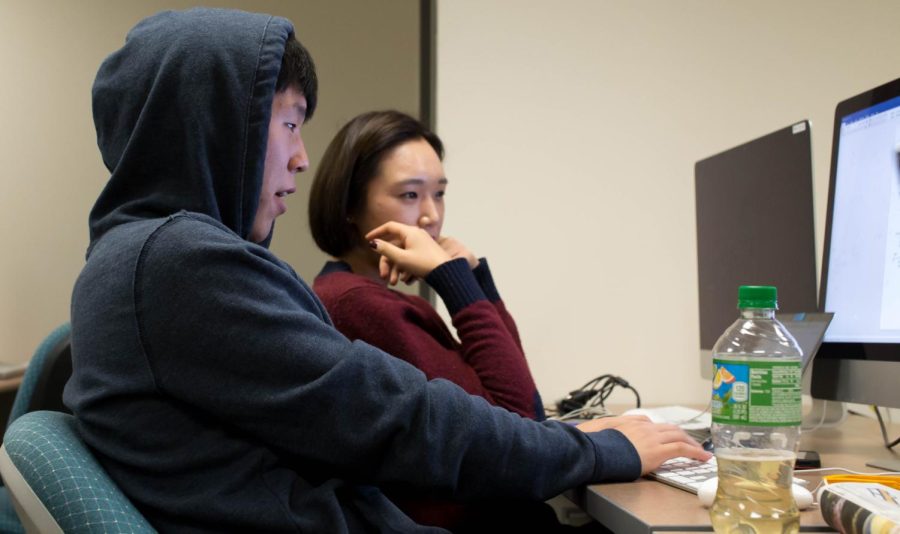 Hyungshok Kim and Jeesoo Kim work on a project in the Franklin media lab on Now. 3, 2015.
