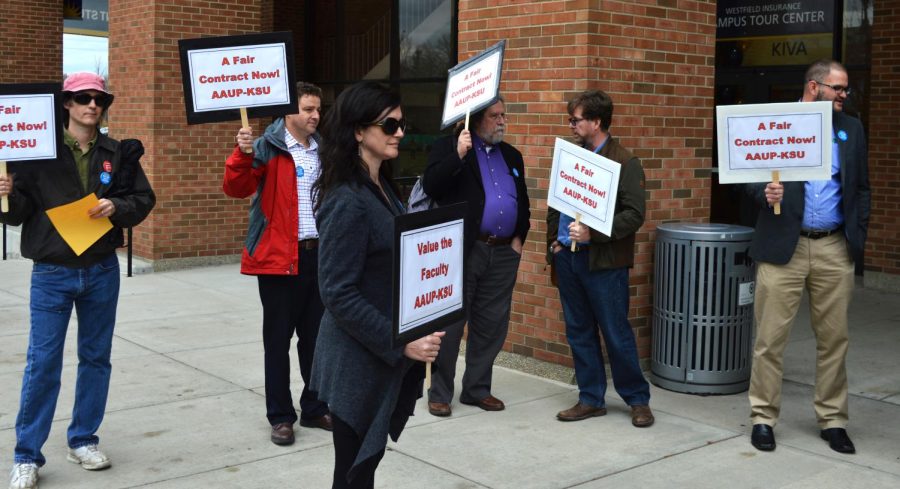 KSU faculty, staff, and supporters silently protest outside of the Kiva center on November 19th, 2015.