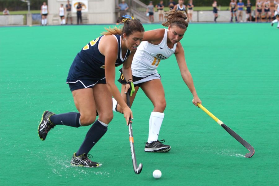 Midfield Ines Delpech protects the ball against a Virginia Commonwealth University player at Murphy-Mellis Field on Saturday, Aug. 29, 2015. The Flashes won in double over-time 4-3.